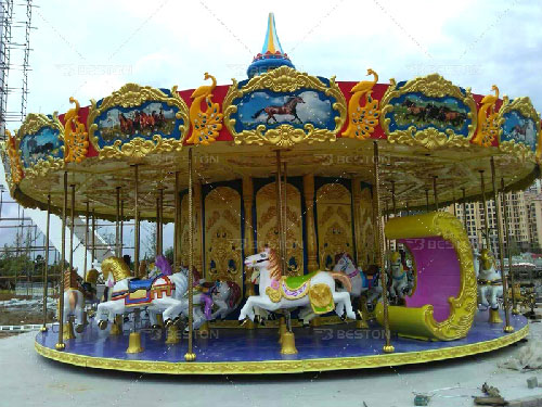 Under-drive grand carousel ride